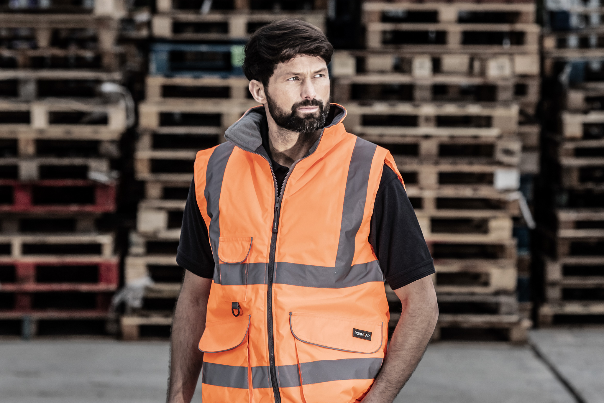 Man wearing hi-vis ROKWEAR gilet.