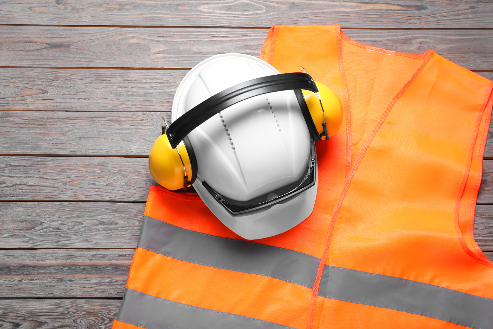 PPE - Hi-vis vest, hard hat and ear defenders.