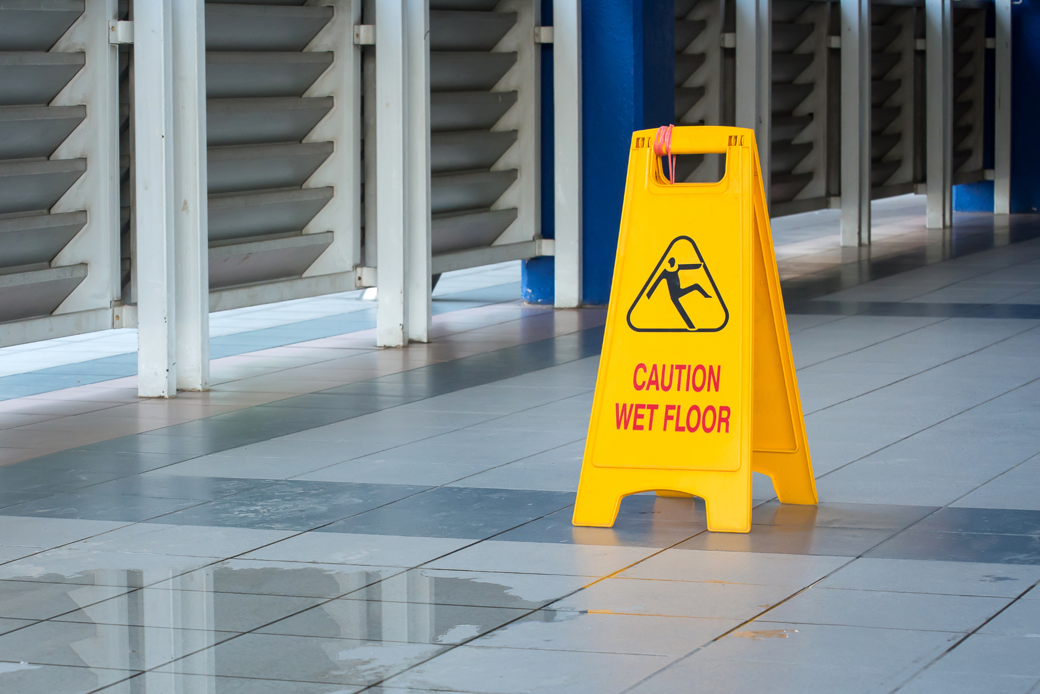 Yellow wet floor sign.