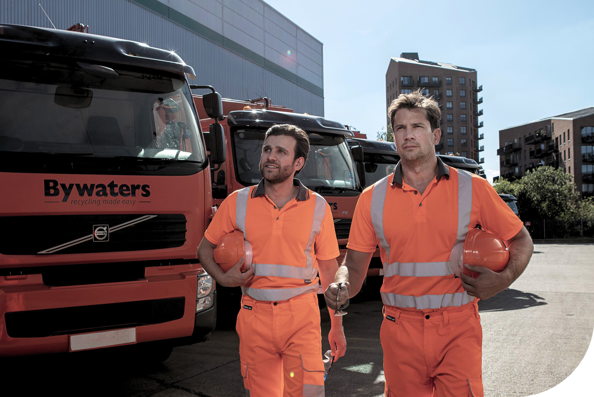 Workers in summer workwear. Hi-vis workwear.