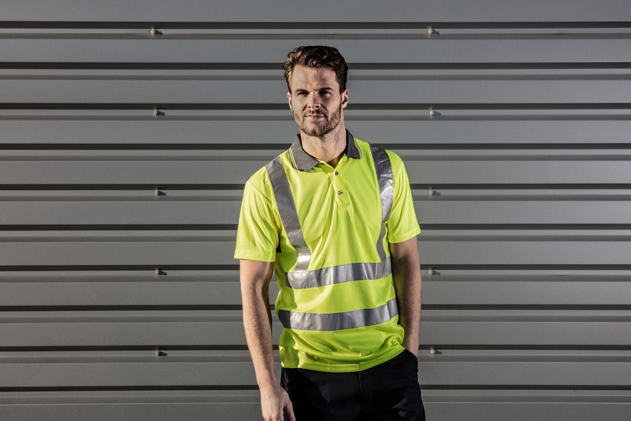 Man wearing yellow hi-vis t-shirt