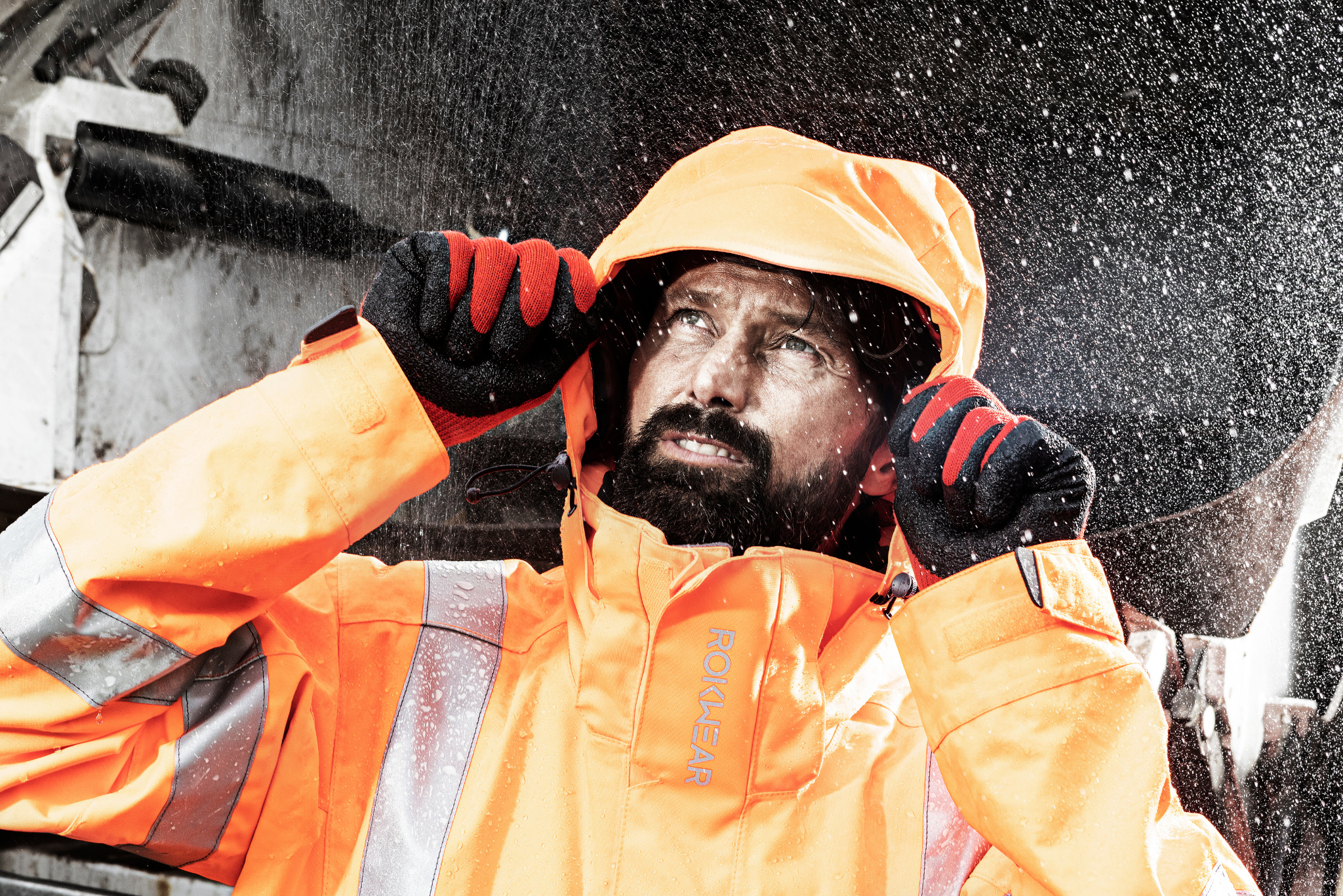 Man wearing waterproof workwear and PPE