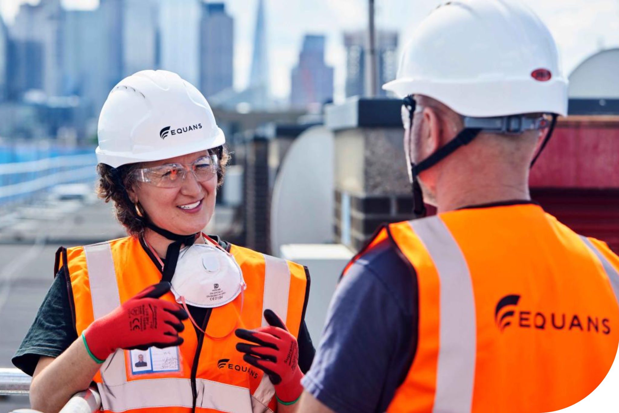 Equans workers in PPE.