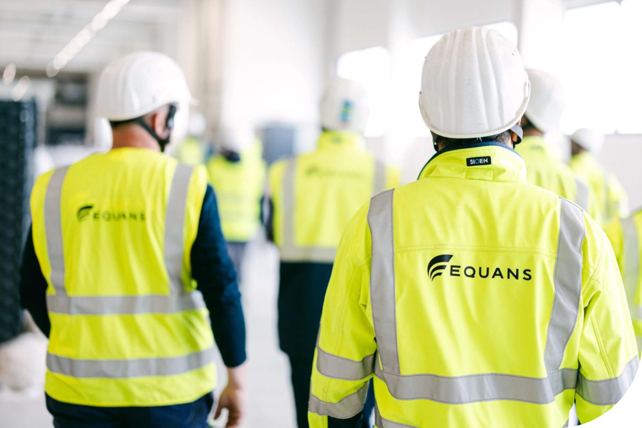 Equans workers in PPE.