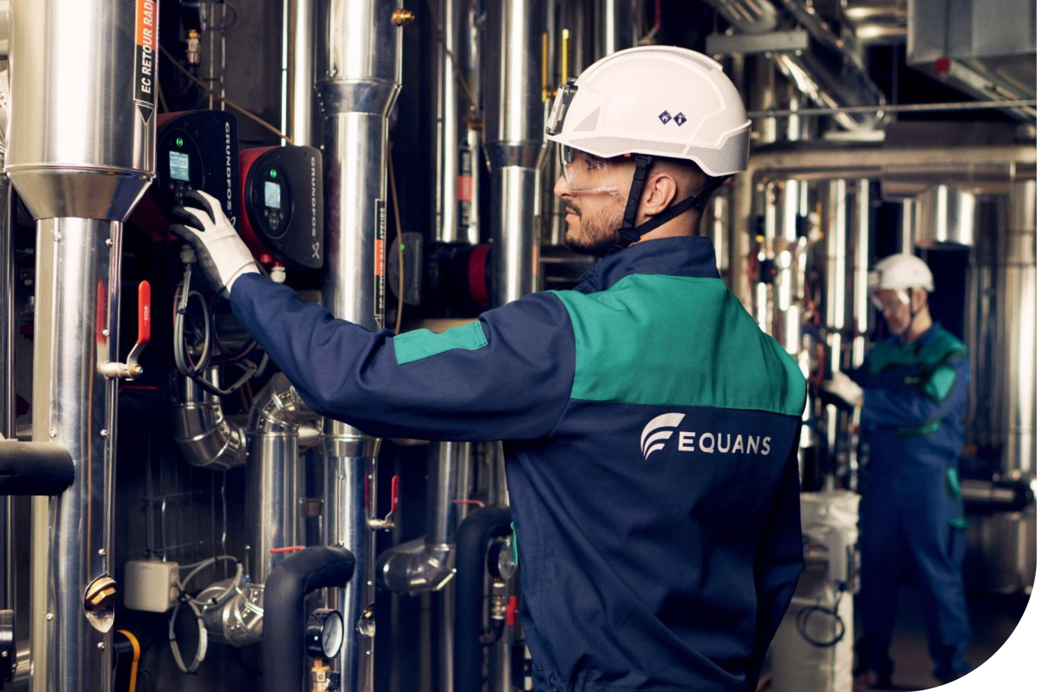 Equans workers in PPE.